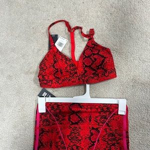 Ivy Park pink & red snakeskin workout set